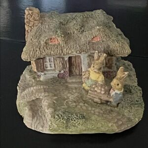 Charming Cottage Figurine with Rabbits